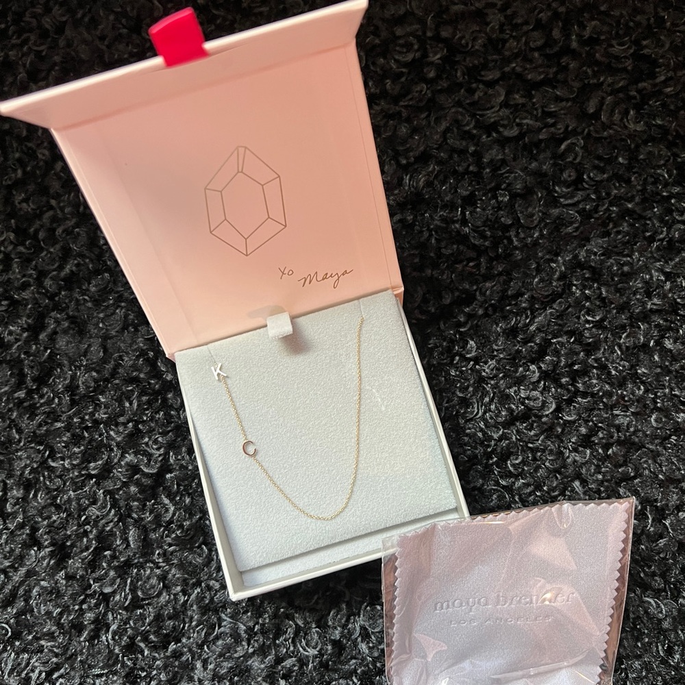 18” 14k gold Maya Brenner 2 letter necklace. (K & C)